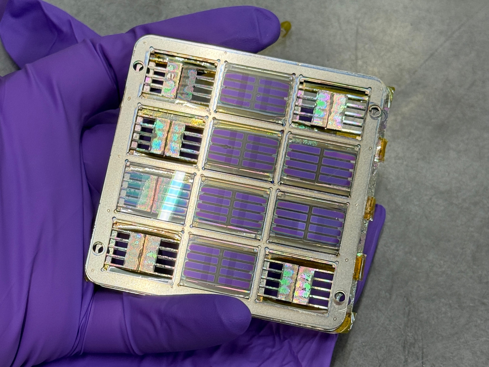 A batch of substrates in the holder after sputtering