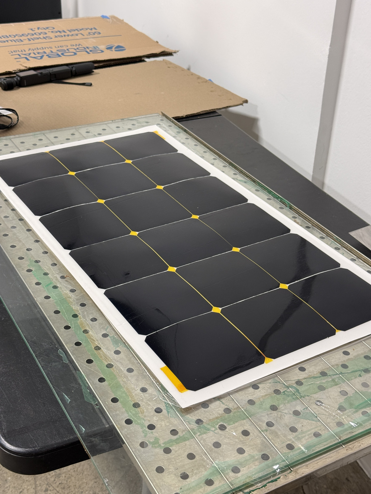An encapsulated solar module on the bench